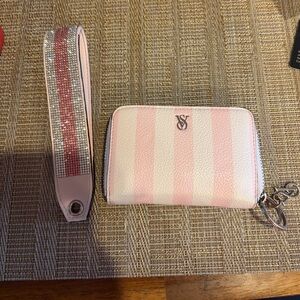 Victoria secret pink and white striped wallet and keychain.